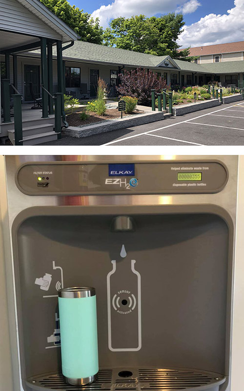 A summer view of Island Place, Bar Harbor, featuring its inviting exterior and eco-friendly water bottle filling station.